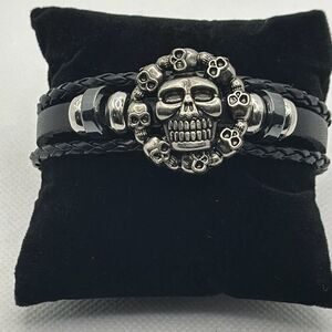 Brand New!! Leather and metal skull and crossbones bracelet